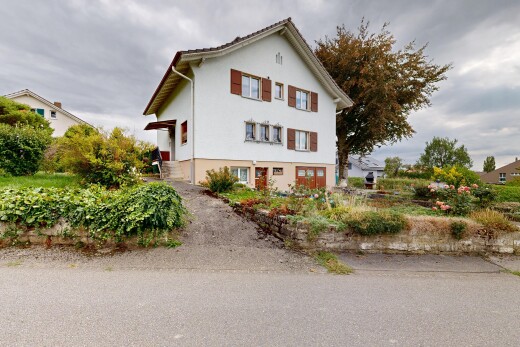 outdoor house with stucco siding