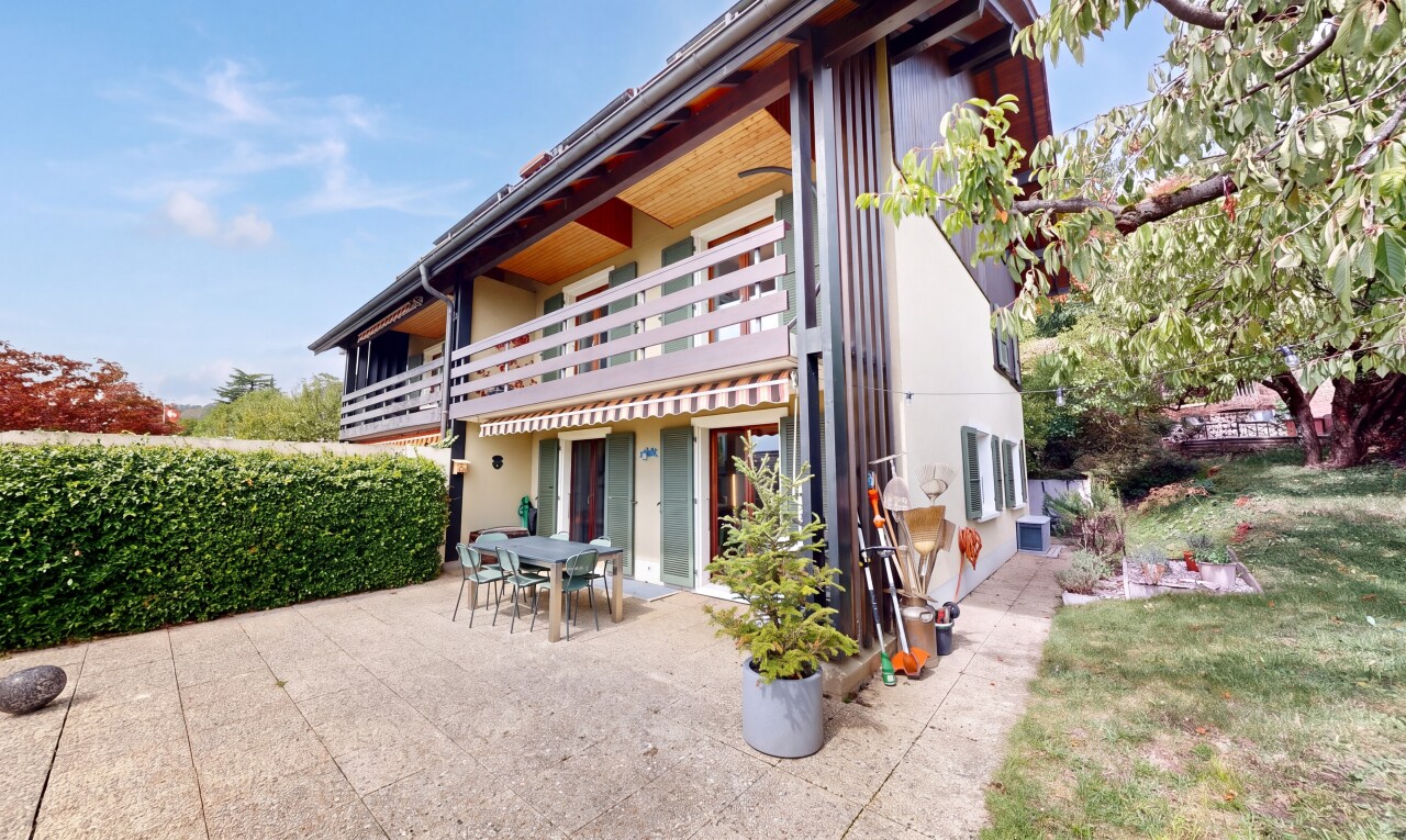 outdoor house featuring a balcony, a patio, and outdoor dining area