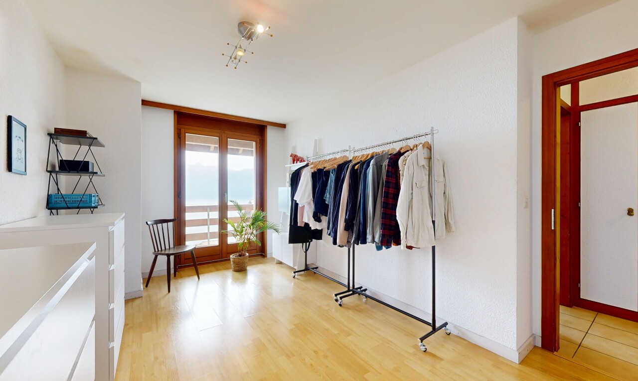 walk in closet featuring light wood-style floors