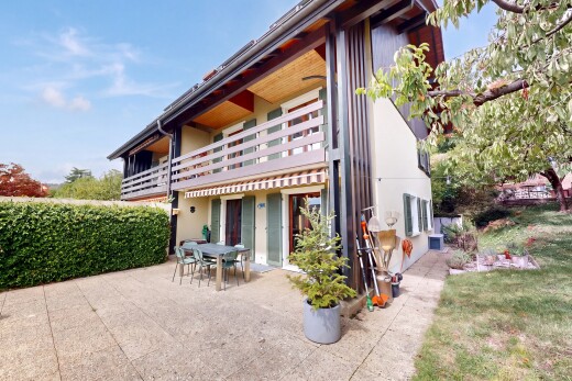 outdoor house featuring a balcony, a patio, and outdoor dining area