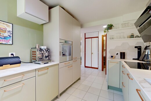 kitchen with extractor fan, stainless steel oven, open shelves, black electric cooktop, and light tile patterned floors