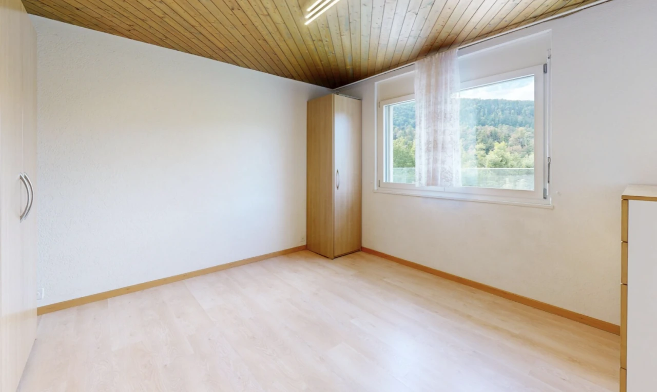 unfurnished room featuring wooden ceiling and light wood finished floors
