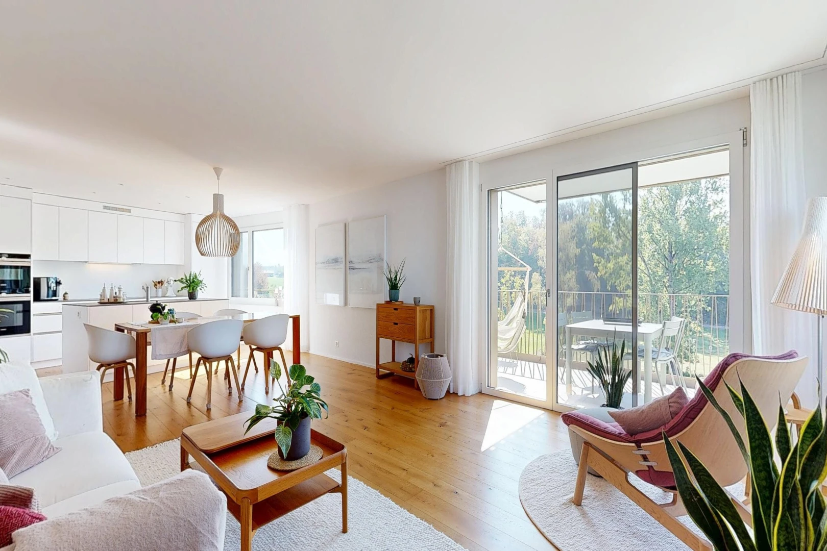 living room with light wood-style floors and access to exterior