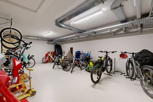 gym featuring a garage and concrete flooring