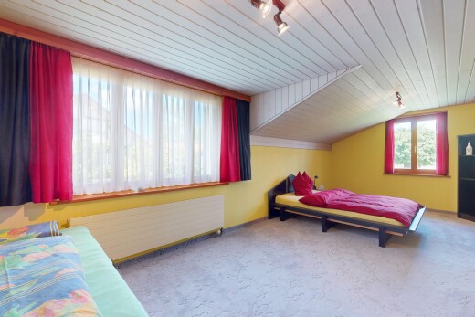 zimmer / schlafzimmer mit natural light, natürliches licht, drywall, gipskartonwand, und inside property