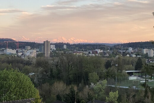 extérieur du bâtiment avec dusk, city view, et vue sur la ville