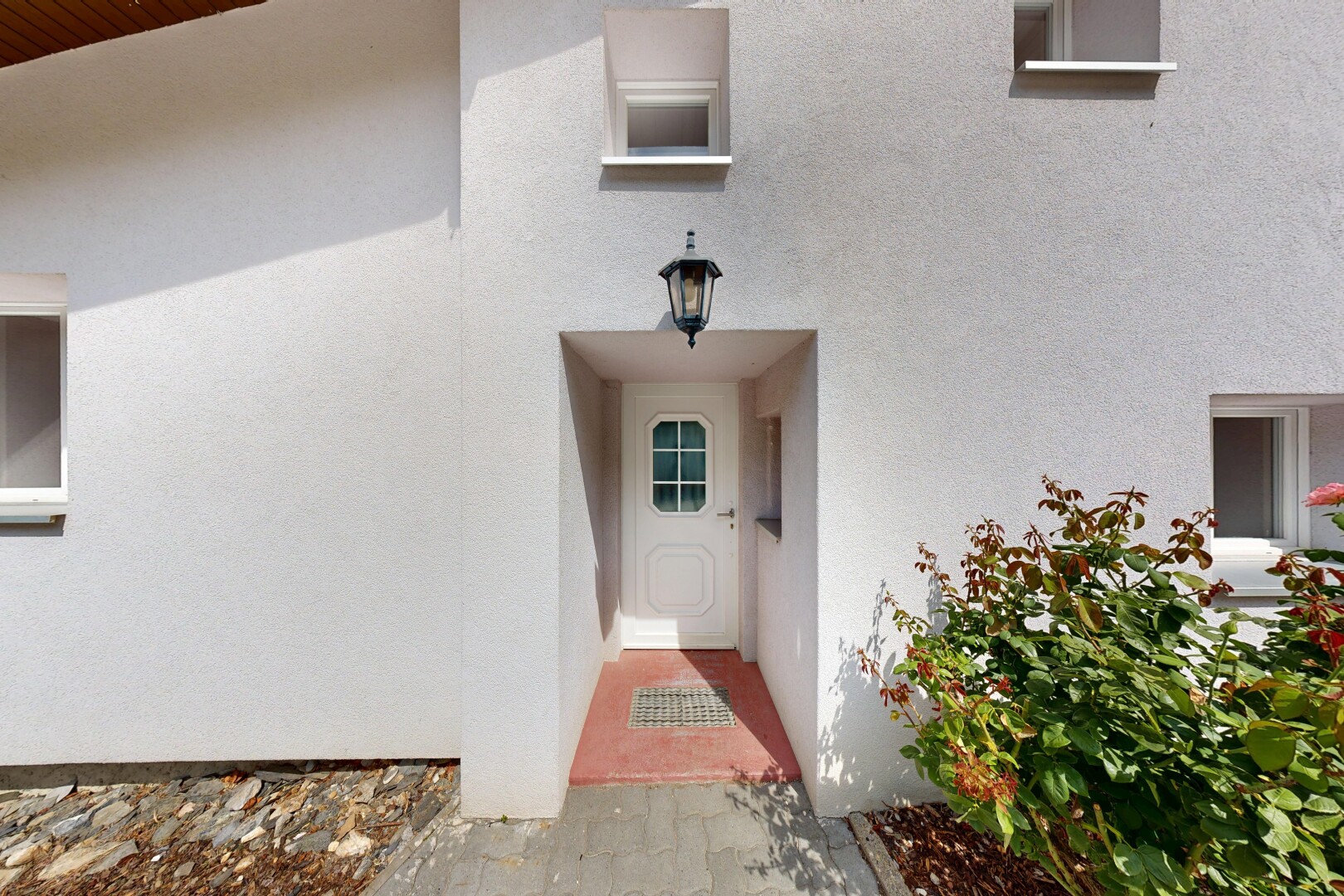 façade avec bardage en stuc et property visible