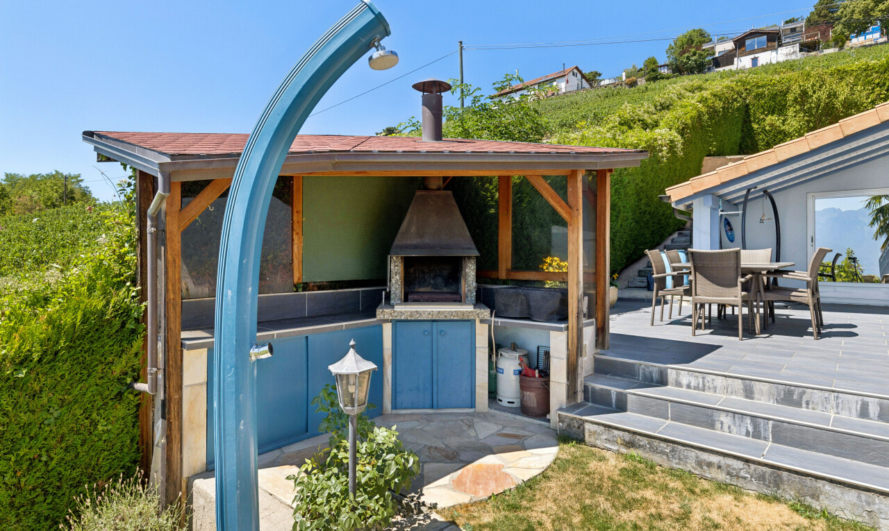 view of home with a patio and outdoor dining area