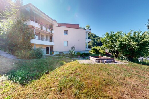 außenansicht mit property visible, day time, stuckverkleidung, und rasen