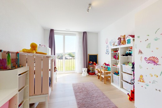 room / bedroom featuring light wood-style flooring and expansive windows