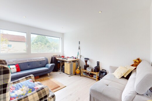 living room with wood finished floors