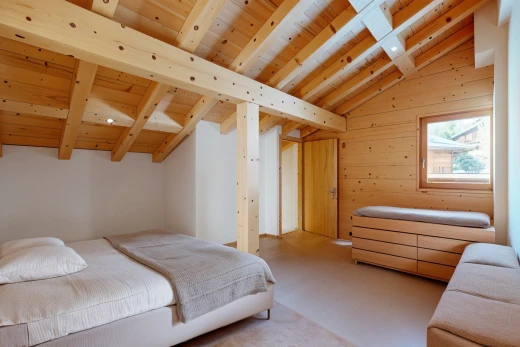 room / bedroom with wood walls, wooden ceiling, and vaulted ceiling with beams