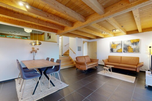 salon / salle à manger avec escaliers, inside property, plafond à poutres, beamed ceiling, et cloison sèche