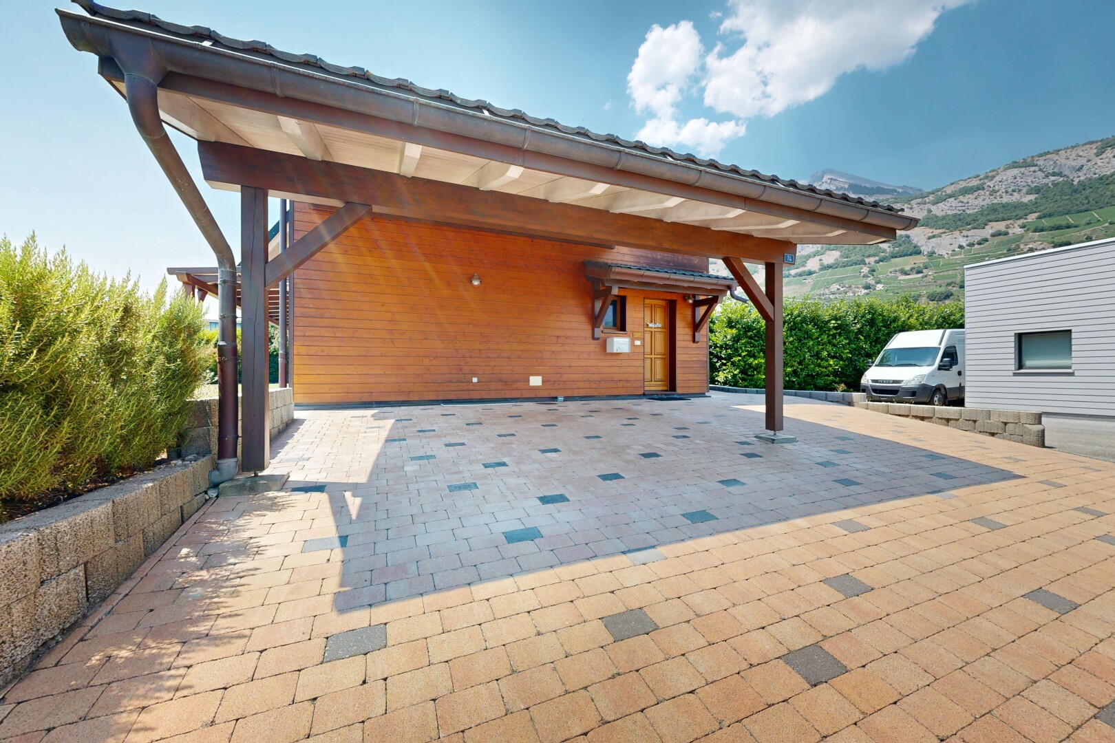 terrasse mit day time, carport angeschlossen, blick auf die berge, mountain view, und from property