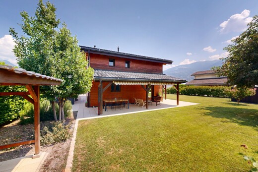 view of home featuring a yard and a patio area