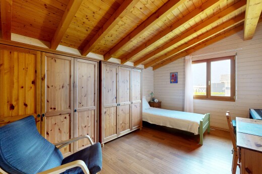 room featuring wood walls, wood finished floors, wood ceiling, and vaulted ceiling with beams