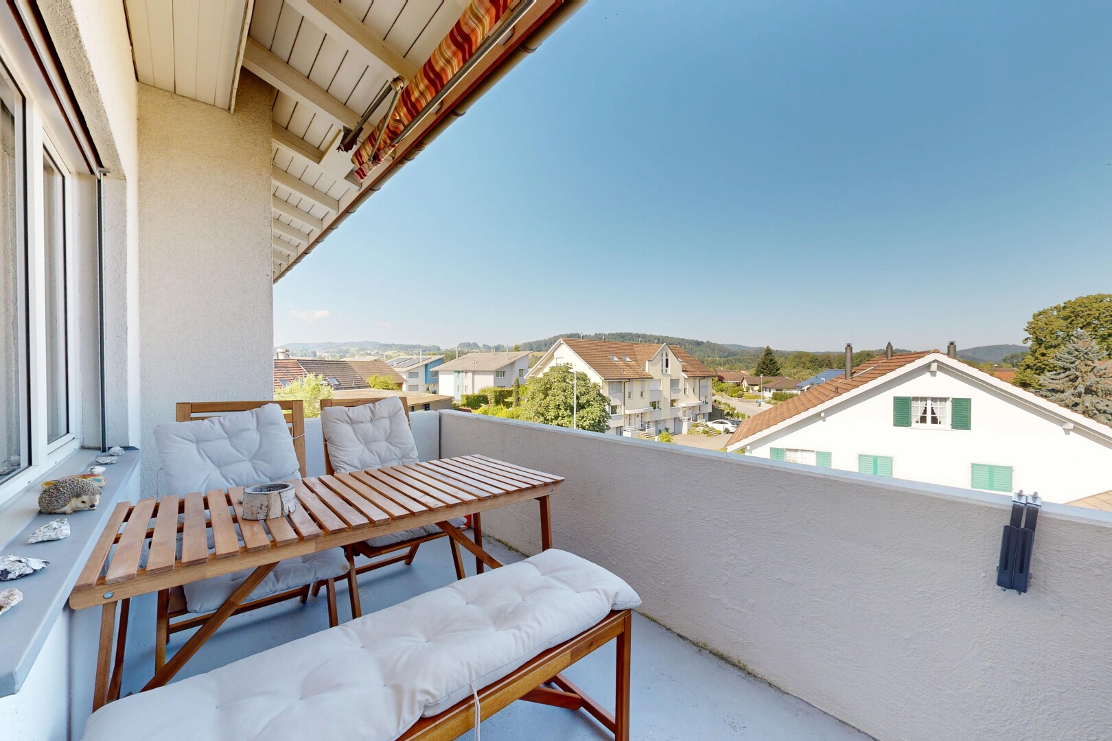 balcony featuring a residential view