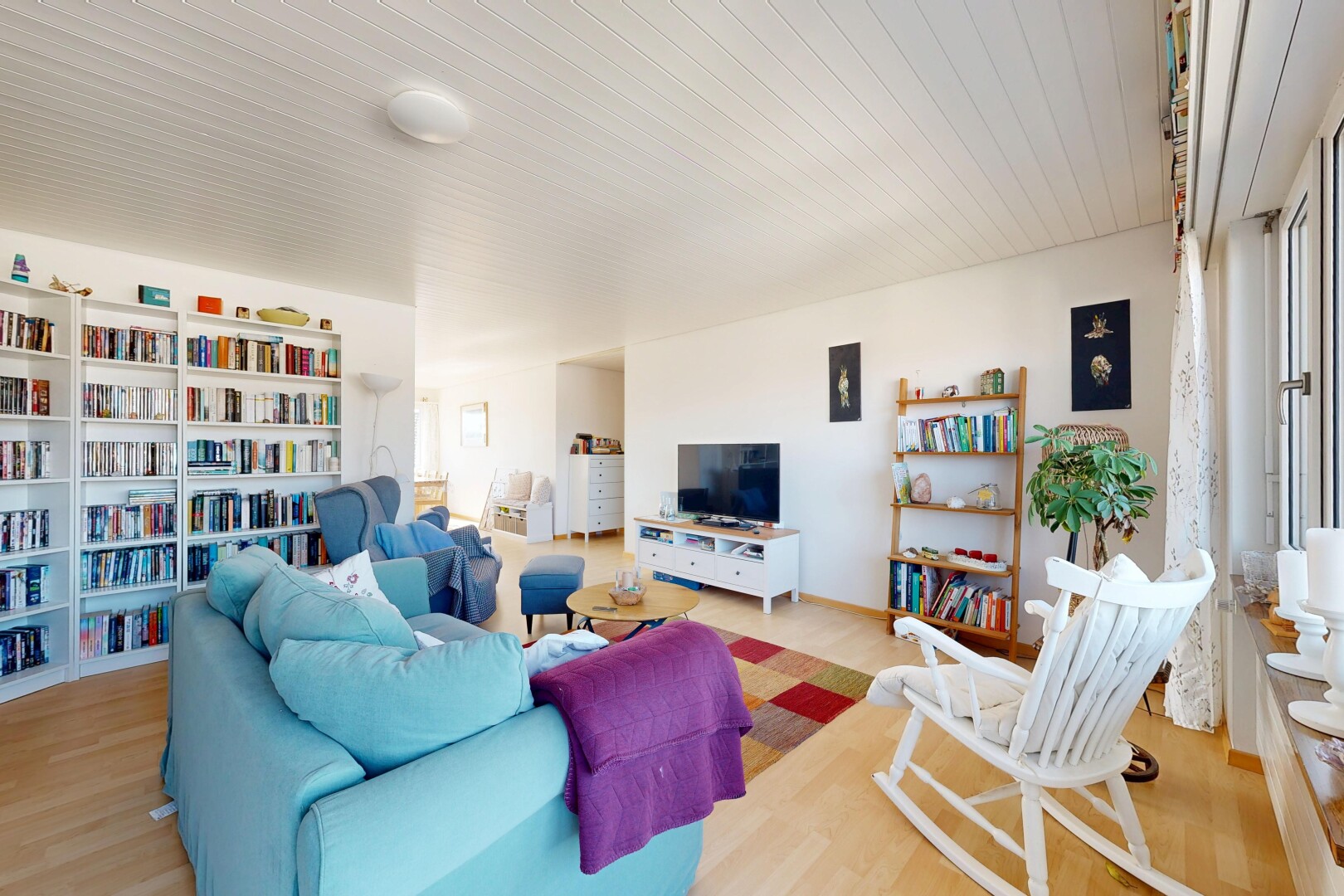 living room featuring light wood-style flooring