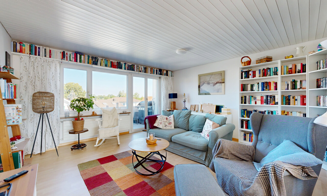 living room with light wood-style floors and wooden ceiling