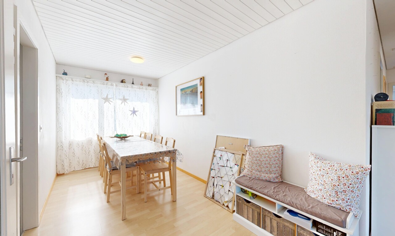 dining space featuring light wood-style floors