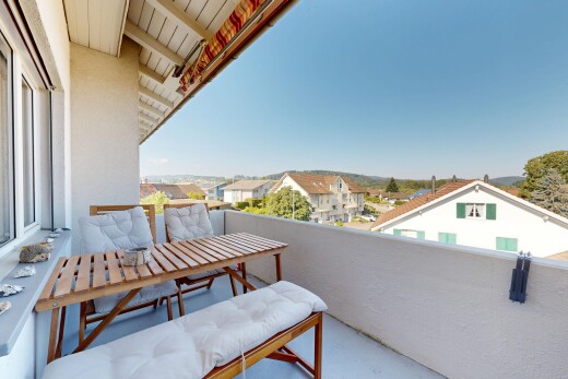 balcony featuring a residential view