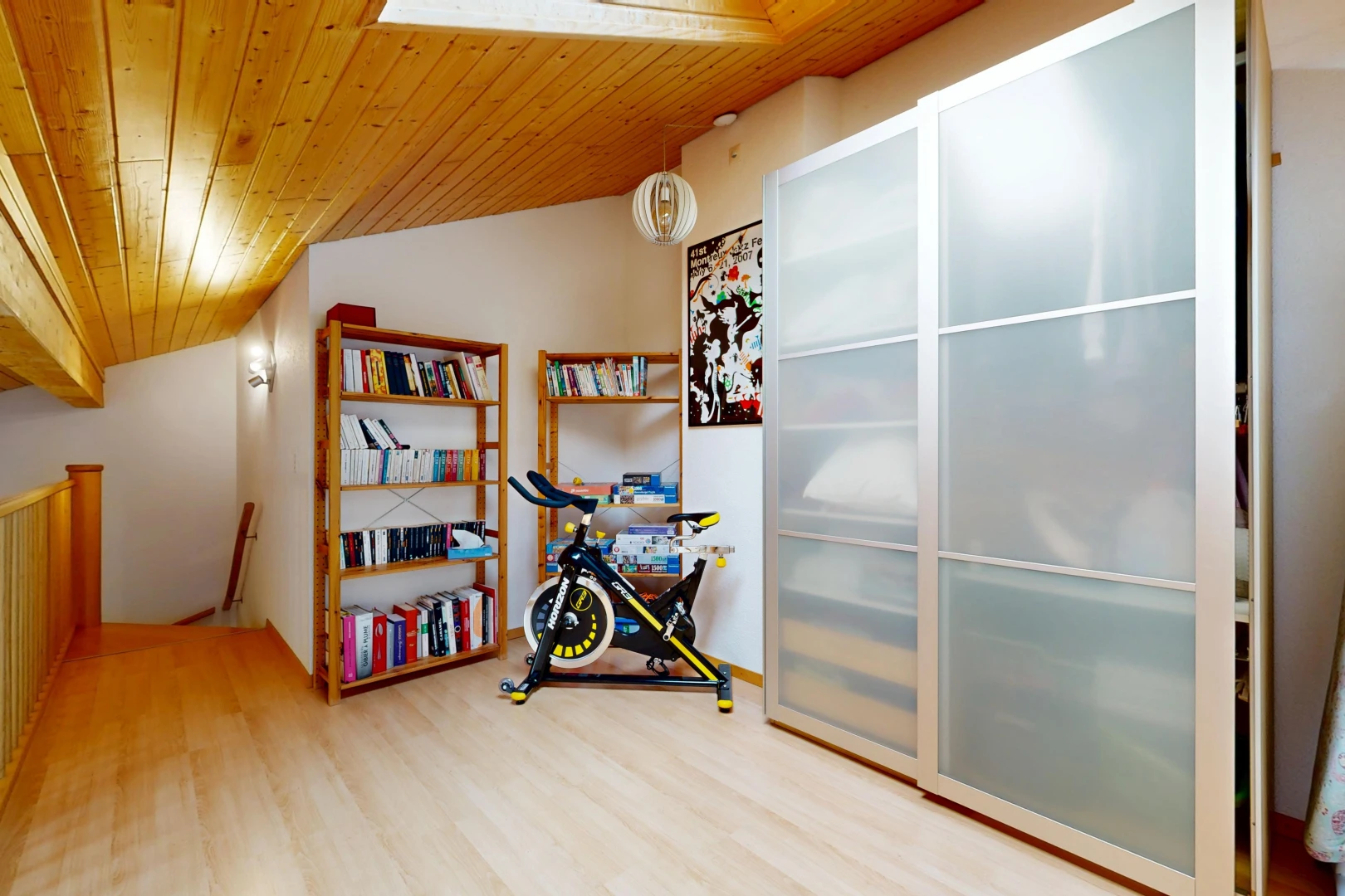 room featuring a vaulted wooden ceiling and light wood-style floors