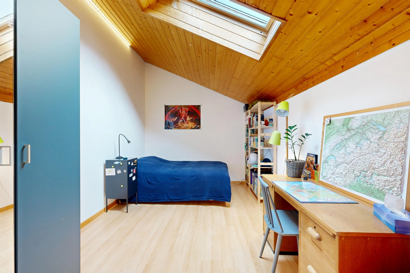 room / bedroom with wood ceiling, lofted ceiling with skylight, an office area, and light wood-type flooring