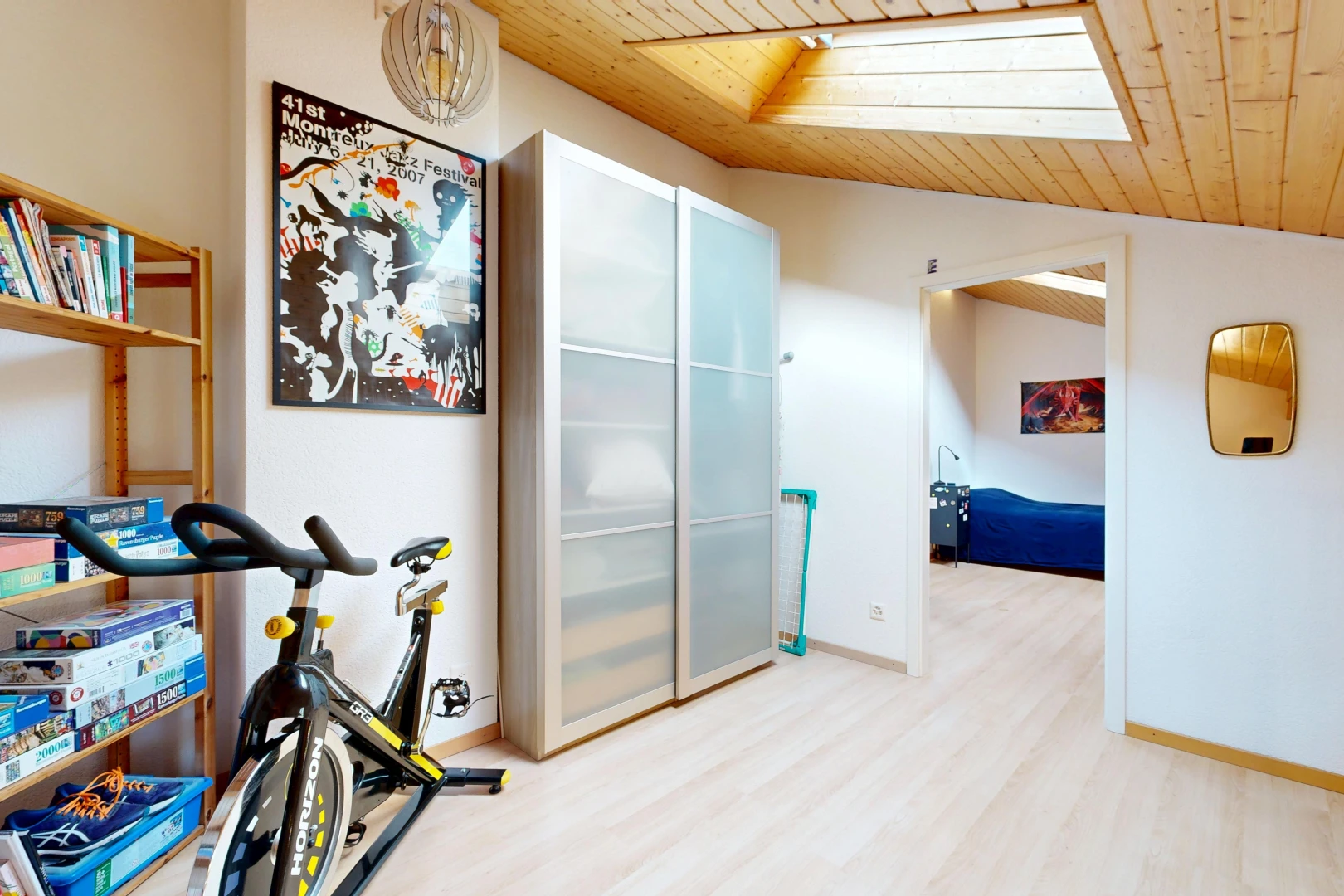 hall with a vaulted wooden ceiling and baseboards