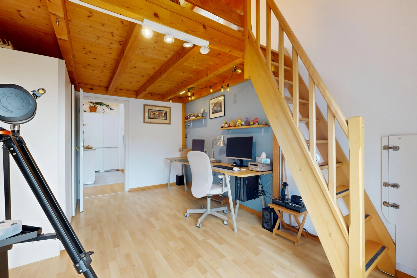 home office with rail lighting, light wood finished floors, and a wood ceiling with exposed beams