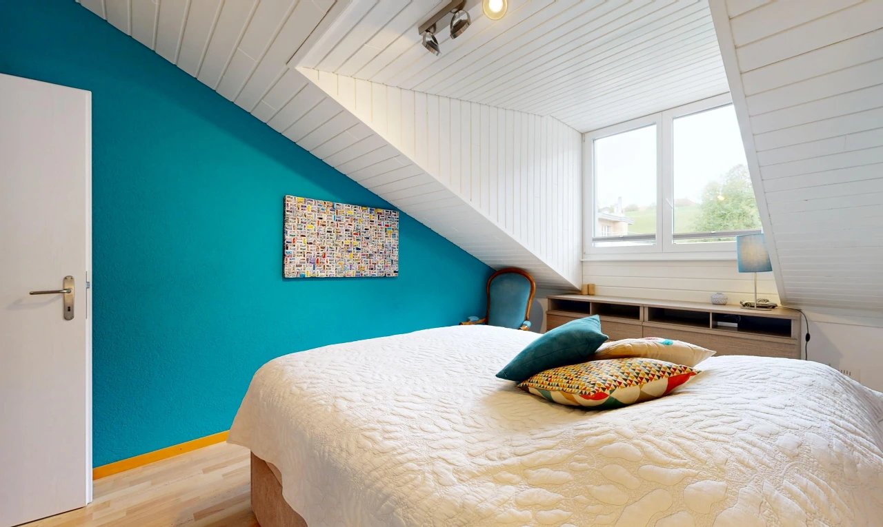 room featuring a vaulted wood ceiling, light wood-style flooring, and track lighting