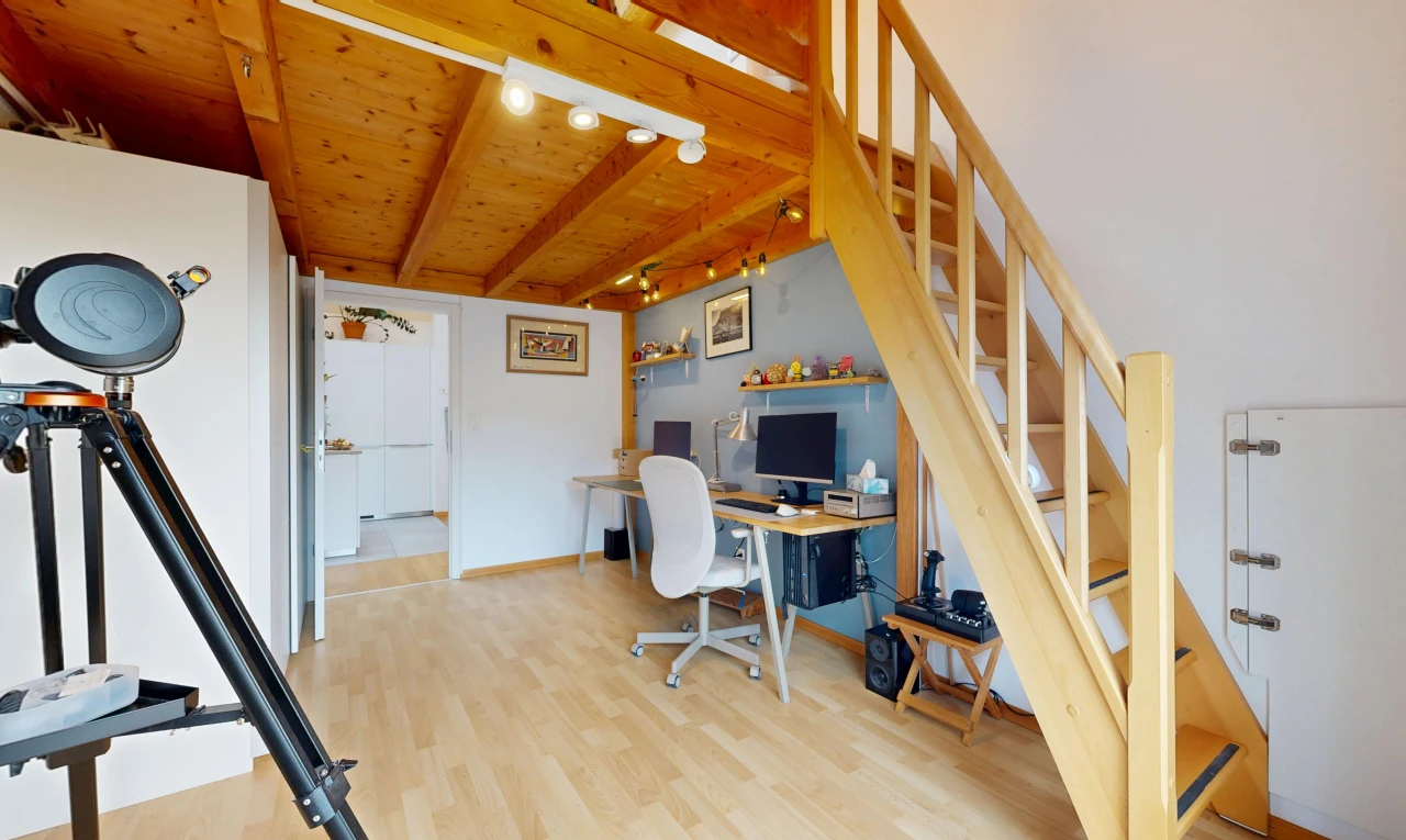 home office with rail lighting, light wood finished floors, and a wood ceiling with exposed beams