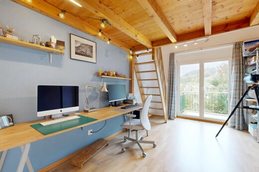 office with access to outside, a wooden ceiling with exposed beams, and light wood finished floors