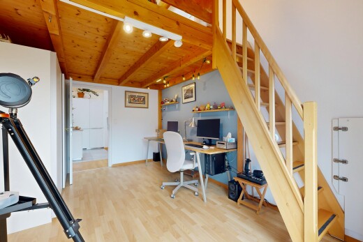 home office with rail lighting, light wood finished floors, and a wood ceiling with exposed beams