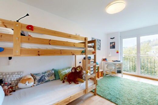 room / bedroom with access to exterior and light wood finished floors