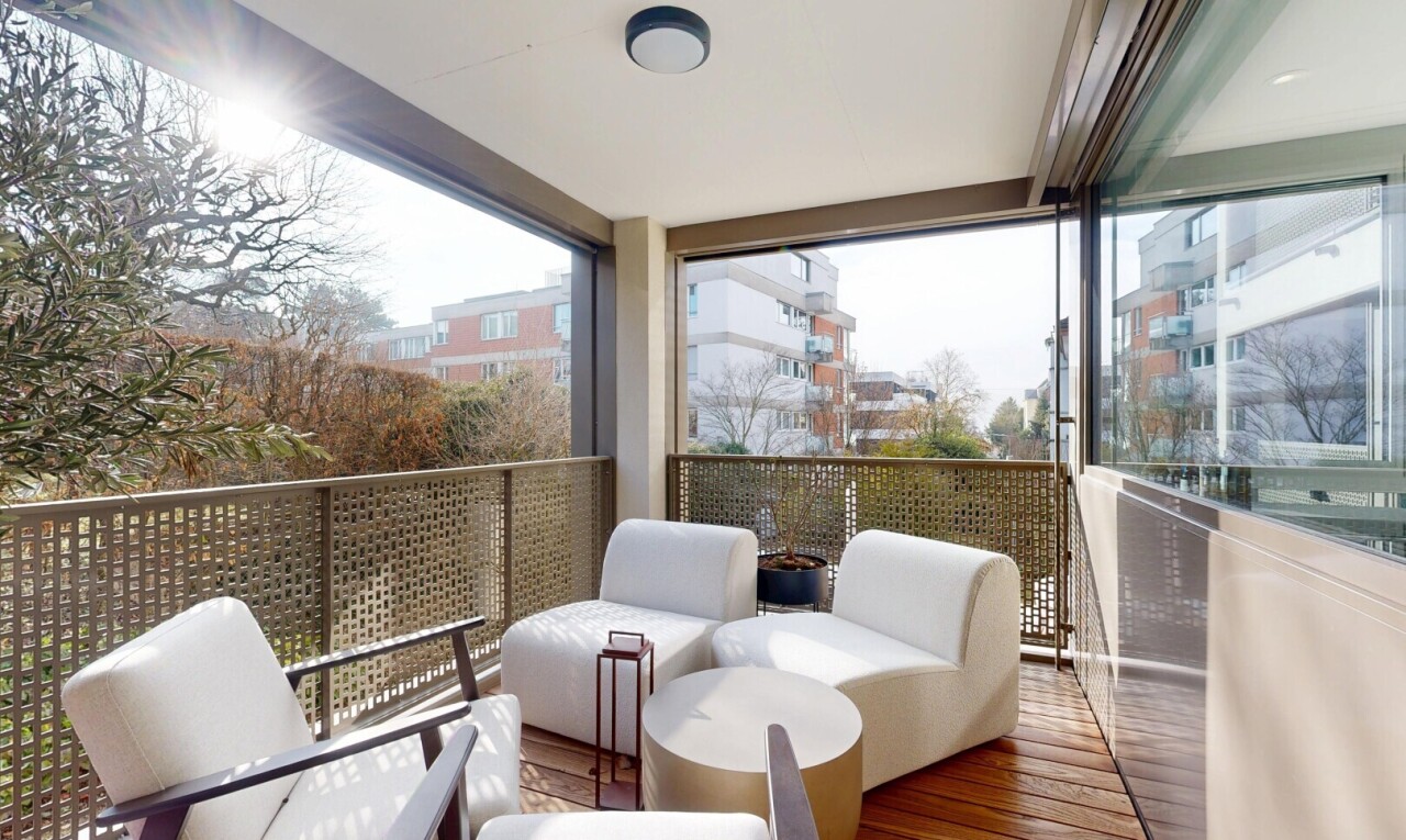 patio / terrace with a balcony and outdoor lounge area