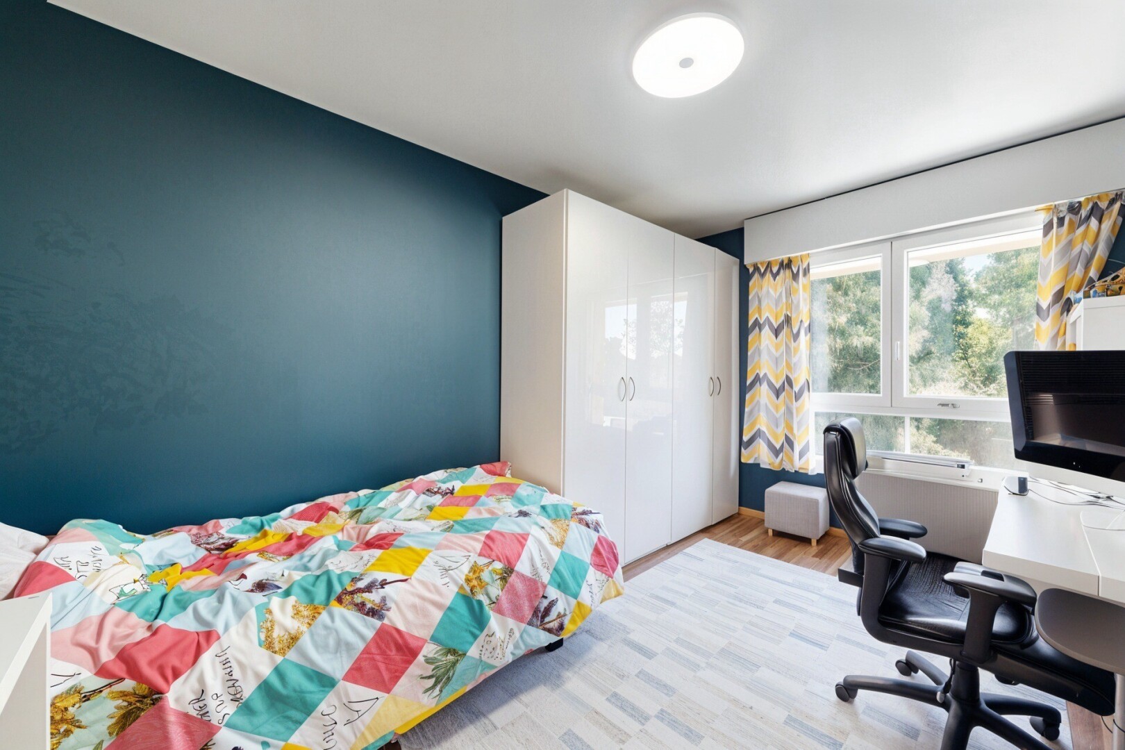 room featuring a desk and wood finished floors