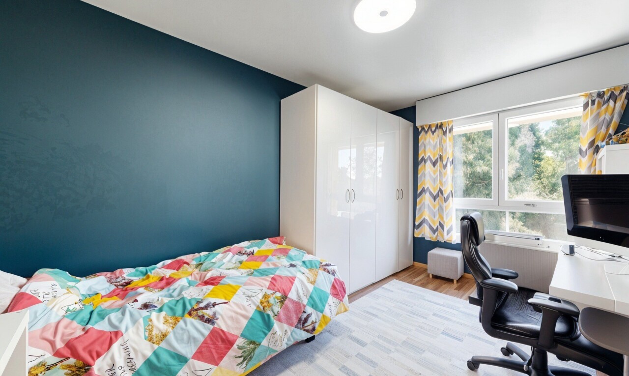 room featuring a desk and wood finished floors
