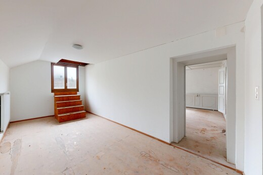 pièce vide avec unfinished floor, inside property, drywall, cloison sèche, et natural light