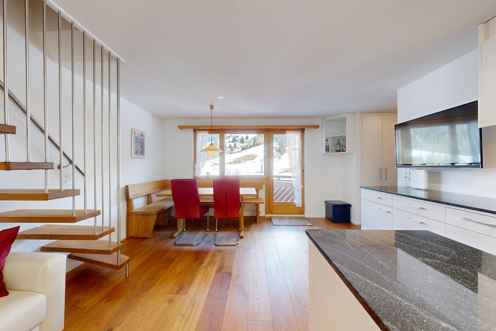 interior space featuring light wood finished floors and stairway