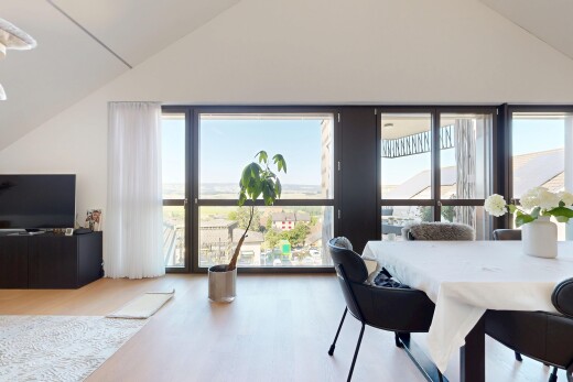 dining space with light wood-type flooring