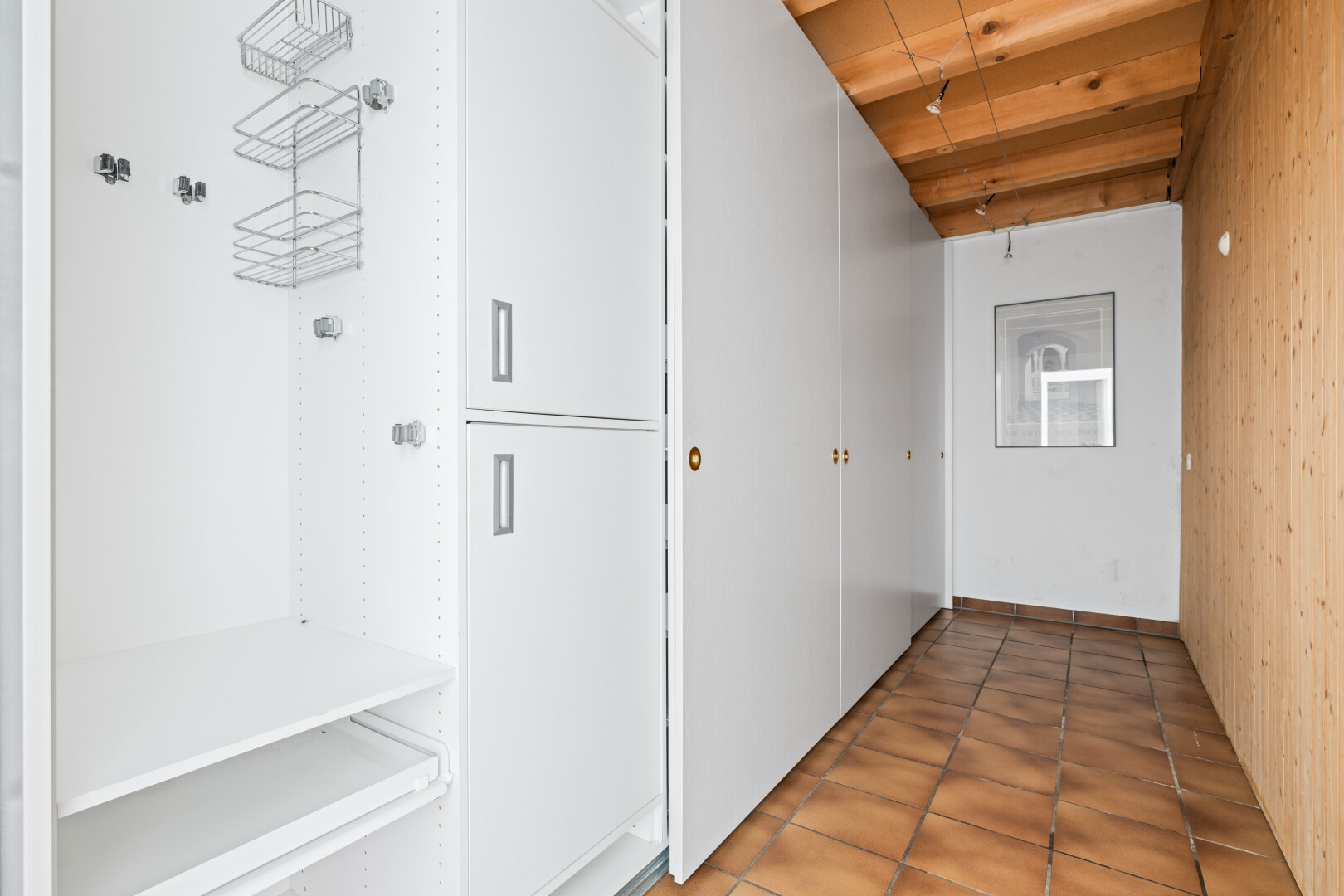corridor with tile patterned floors