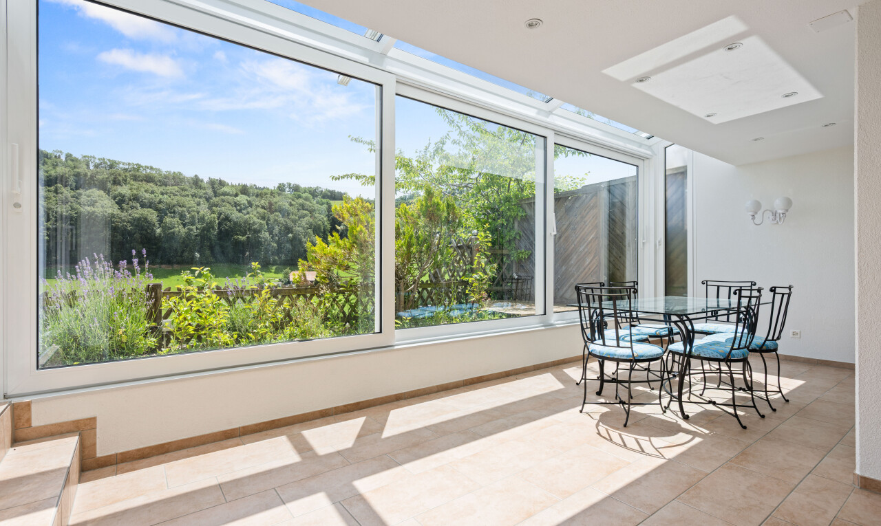dining area with light tile patterned flooring