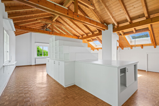 unfurnished room with parquet flooring, a wood ceiling with exposed beams, and a skylight