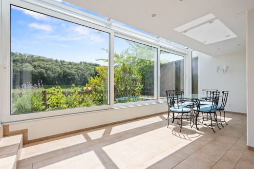 dining area with light tile patterned flooring