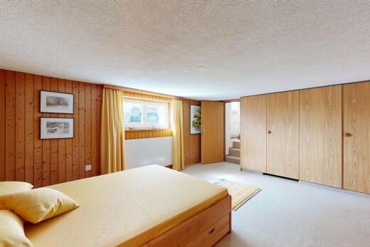 chambre avec sous-sol, inside property, moquette, carpet, et lumière naturelle