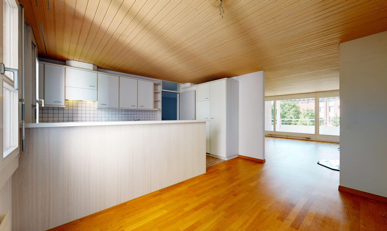 spare room with light wood-style floors and wooden ceiling