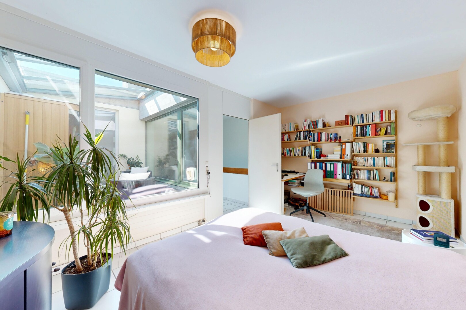 room / bedroom featuring an office area