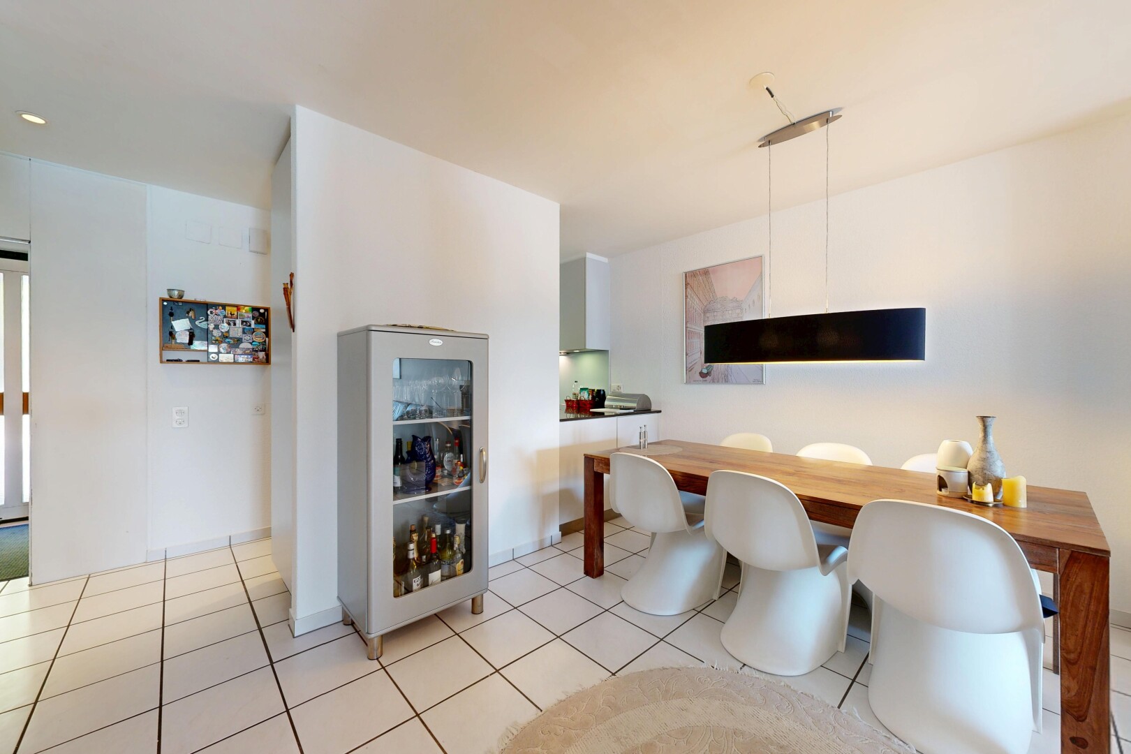 dining area featuring light tile patterned floors