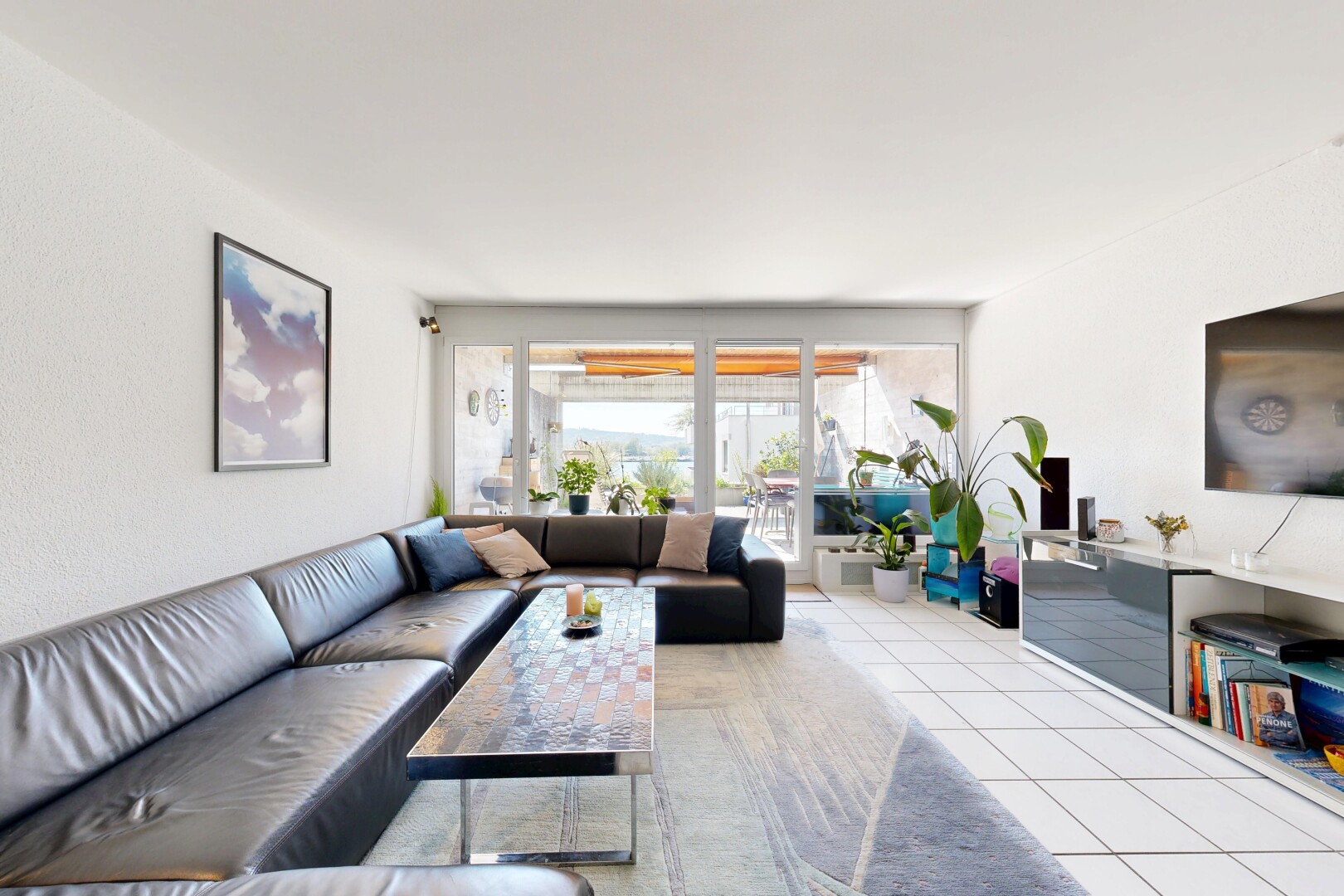 living room featuring light tile patterned flooring