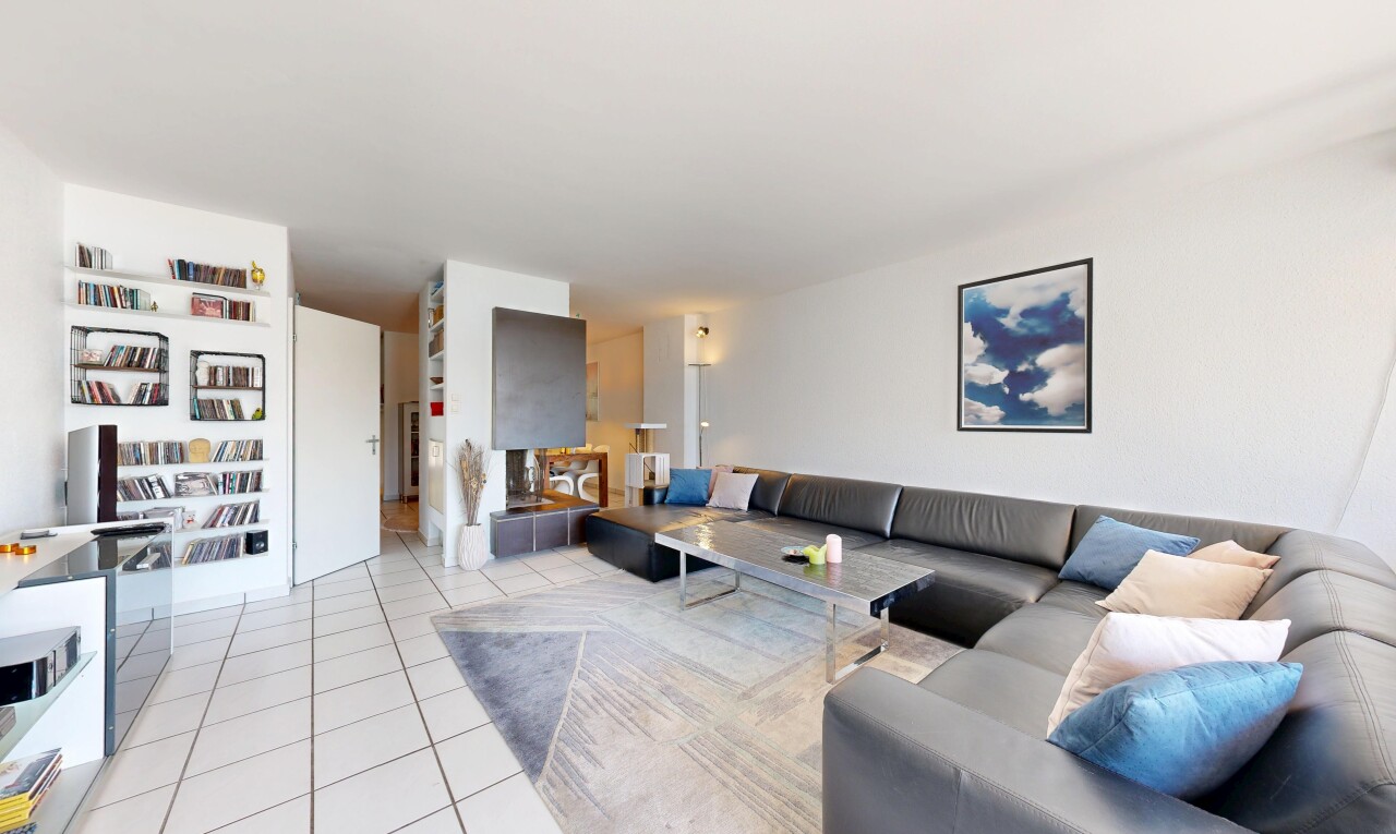living area featuring light tile patterned flooring